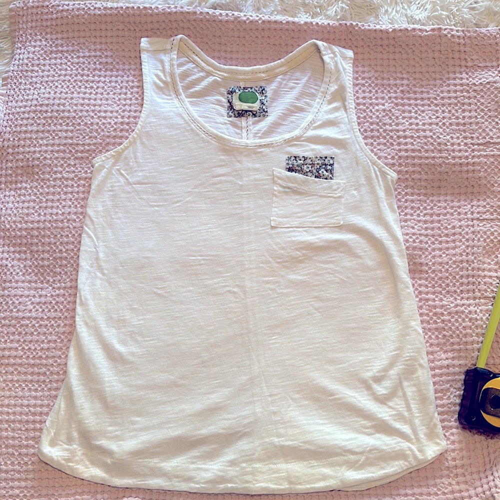 XS white tank with flowers on pocket and etchings